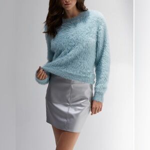 Crescent Vegan Leather Mini Skirt